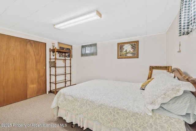 carpeted bedroom with a closet