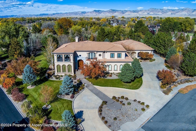 drone / aerial view featuring a mountain view