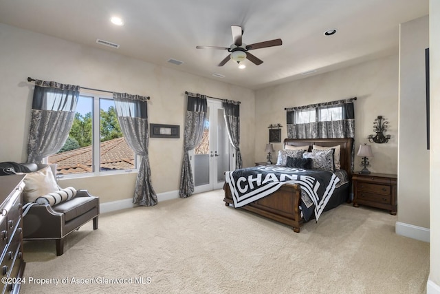 carpeted bedroom featuring ceiling fan