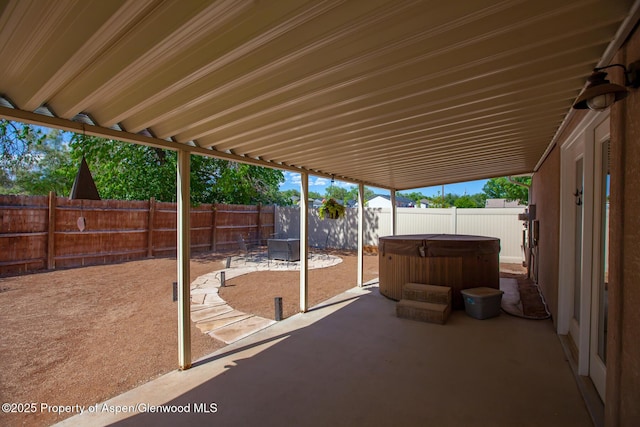 2939 Jon Hall Rd, Grand Junction, CO 81503 - fenced backyard featuring a patio and a hot tub