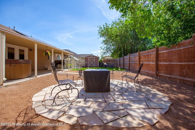 2939 Jon Hall Rd, Grand Junction, CO 81503 - fenced backyard with a patio and a hot tub