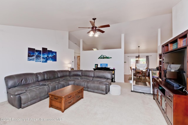 2939 Jon Hall Rd, Grand Junction, CO 81503 - living room with light colored carpet, ceiling fan, and vaulted ceiling