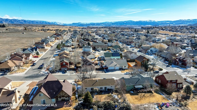 birds eye view of property with a residential view and a mountain view