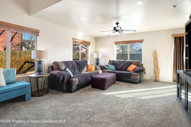 carpeted living area featuring ceiling fan and recessed lighting