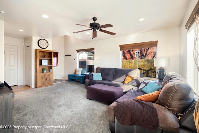 carpeted living room featuring a ceiling fan and recessed lighting