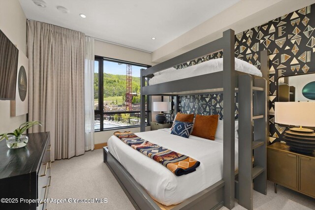 77 Wood Rd Unit 507-10, Snowmass Village, CO 81615 - bedroom with carpet and recessed lighting