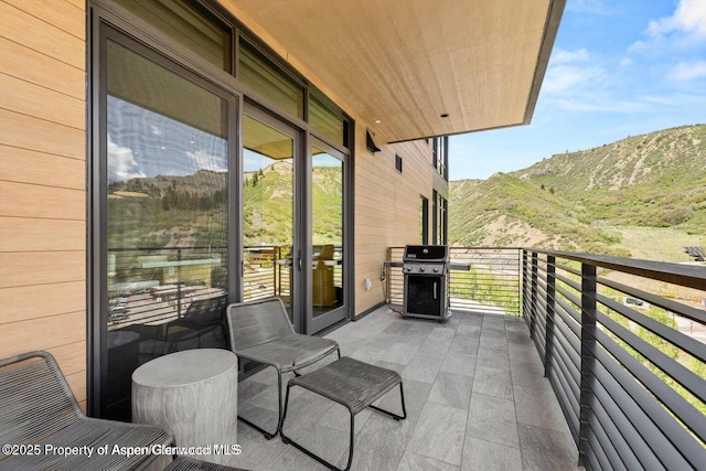 77 Wood Rd Unit 507-10, Snowmass Village, CO 81615 - balcony with area for grilling and a mountain view
