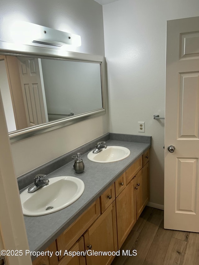1527 Blake Ave Unit 201, Glenwood Springs, CO 81601 - full bathroom with double vanity and wood finished floors