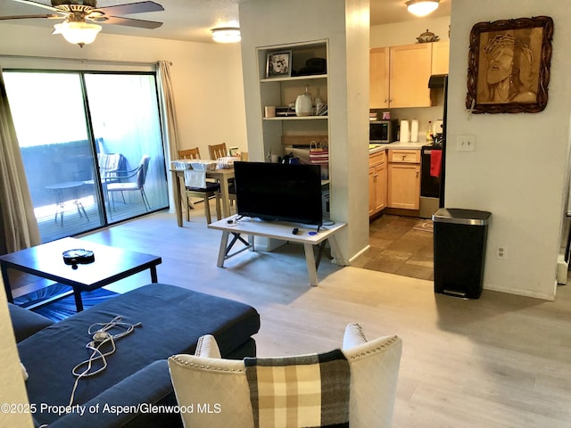 1527 Blake Ave Unit 201, Glenwood Springs, CO 81601 - living room with ceiling fan and wood finished floors