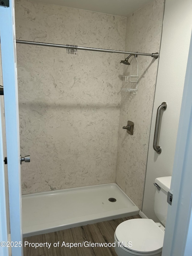 1527 Blake Ave Unit 201, Glenwood Springs, CO 81601 - bathroom featuring a shower and wood finished floors