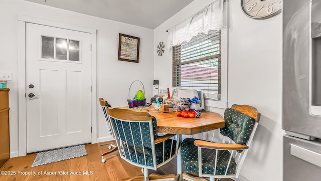 1028 Breeze St, Craig, CO 81625 - dining area with wood finished floors and baseboards