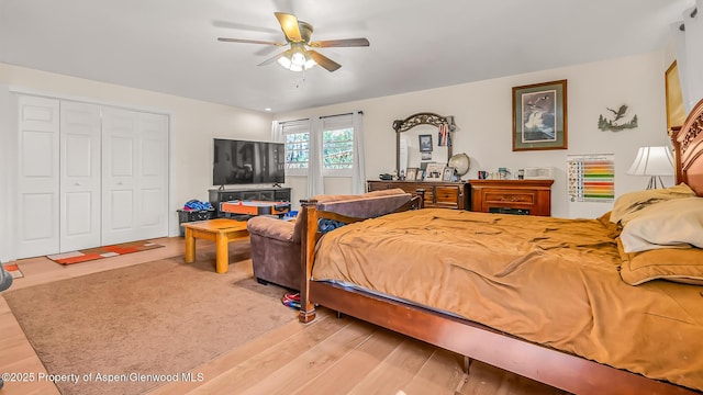 1028 Breeze St, Craig, CO 81625 - bedroom featuring light wood-style flooring, a closet, and ceiling fan