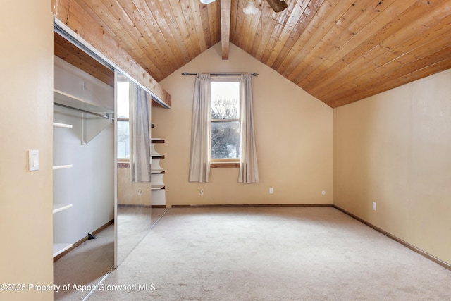 additional living space with vaulted ceiling with beams, light carpet, and wooden ceiling