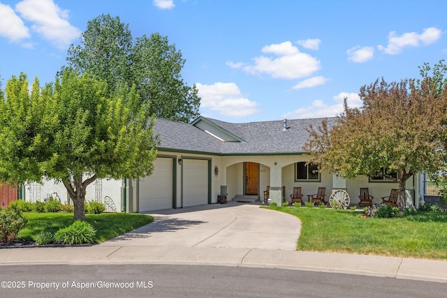 433 Eagles View Ct, Silt, CO 81652 - single story home with an attached garage, concrete driveway, a shingled roof, a front lawn, and stucco siding