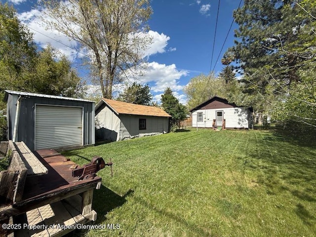 720 Taylor St, Craig, CO 81625 - view of grassy yard featuring an outbuilding