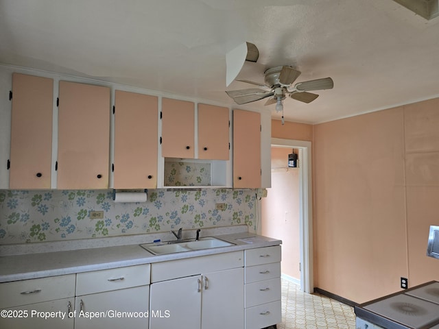 720 Taylor St, Craig, CO 81625 - kitchen featuring a sink, light countertops, ceiling fan, range, and open shelves