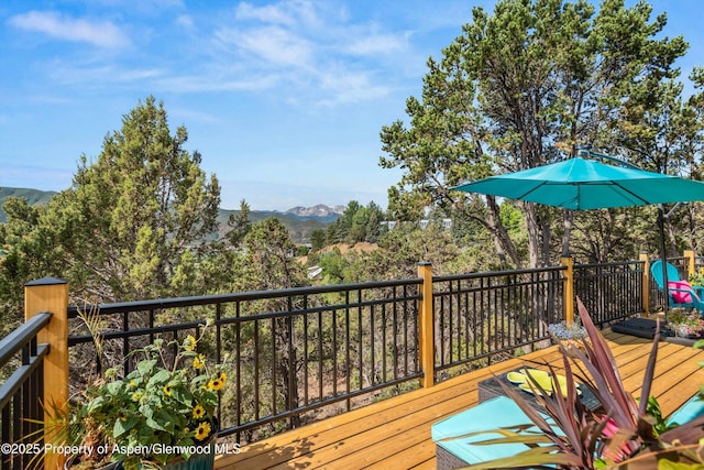 679 Pinon Dr, Basalt, CO 81621 - wooden terrace with a mountain view