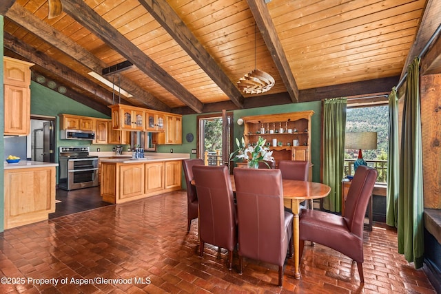 679 Pinon Dr, Basalt, CO 81621 - dining room featuring wooden ceiling and brick floors