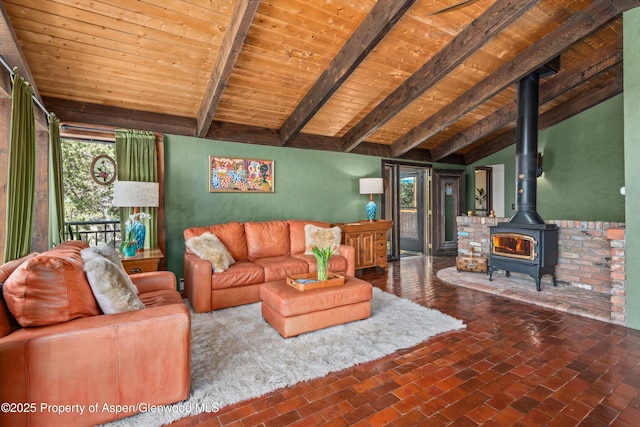 679 Pinon Dr, Basalt, CO 81621 - living room featuring wooden ceiling, a wood stove, and brick flooring