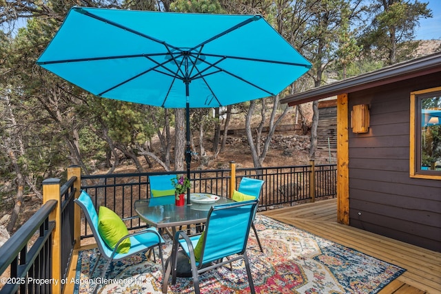 679 Pinon Dr, Basalt, CO 81621 - wooden deck with outdoor dining space