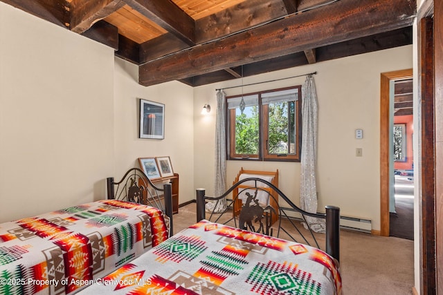 679 Pinon Dr, Basalt, CO 81621 - carpeted bedroom with beamed ceiling and a baseboard heating unit