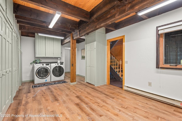 679 Pinon Dr, Basalt, CO 81621 - laundry area with a baseboard radiator, cabinet space, independent washer and dryer, light wood-style floors, and wood ceiling