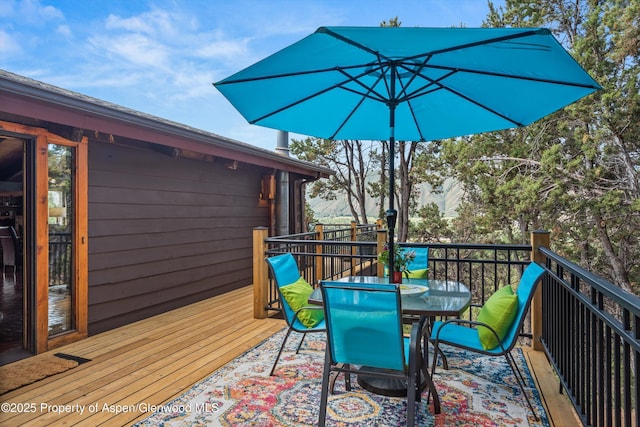 679 Pinon Dr, Basalt, CO 81621 - wooden deck featuring outdoor dining area