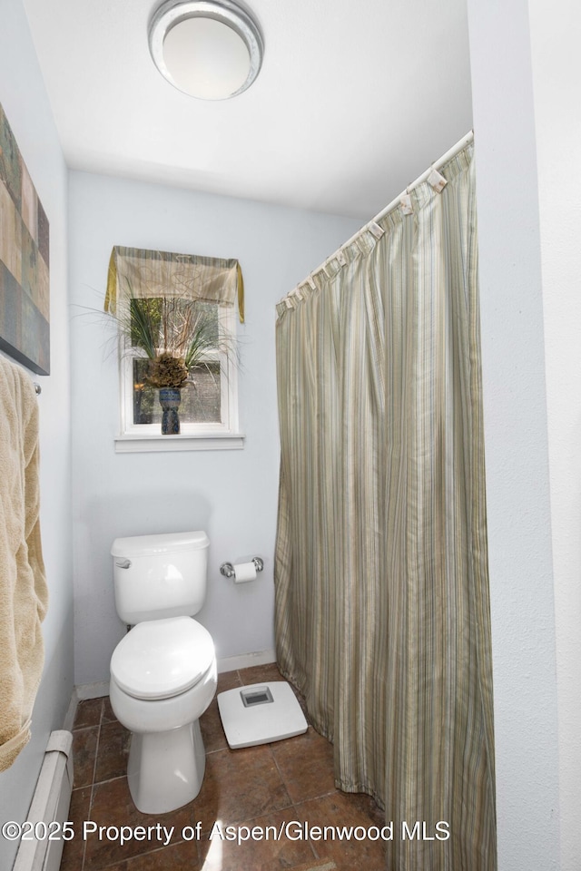 905 Meadow Run, Glenwood Springs, CO 81601 - full bath with a baseboard radiator and tile patterned floors