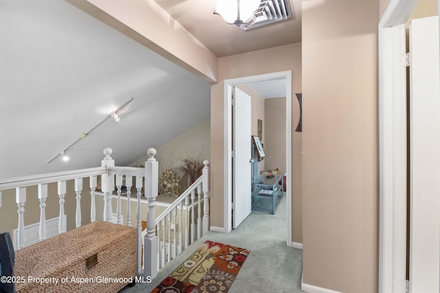 905 Meadow Run, Glenwood Springs, CO 81601 - hall with an upstairs landing, carpet flooring, and rail lighting