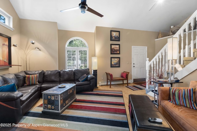 905 Meadow Run, Glenwood Springs, CO 81601 - living room with baseboard heating, a ceiling fan, wood finished floors, and stairs