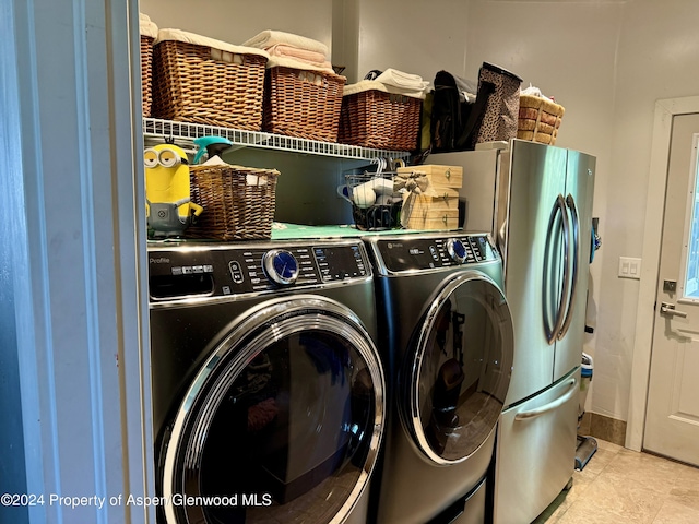 laundry area featuring independent washer and dryer