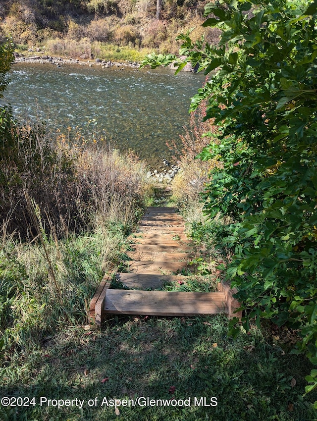 view of yard with a water view