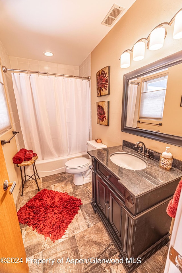 1001 Alta Ct, Craig, CO 81625 - full bath with vanity, toilet, and shower / bath combo with shower curtain