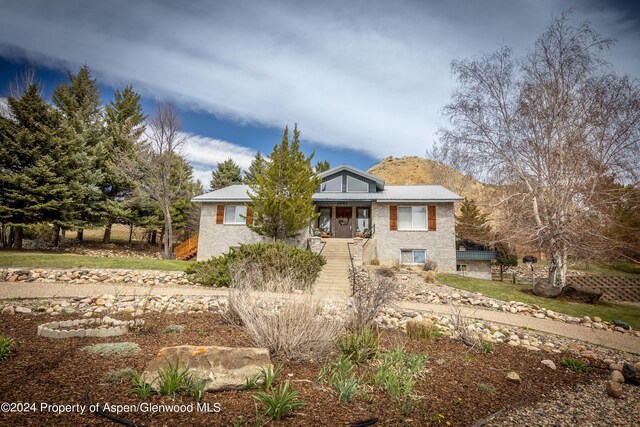 1001 Alta Ct, Craig, CO 81625 - view of front of home featuring stairs and brick siding