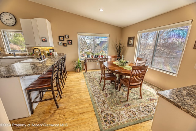 1001 Alta Ct, Craig, CO 81625 - dining area featuring vaulted ceiling, light wood finished floors, and recessed lighting