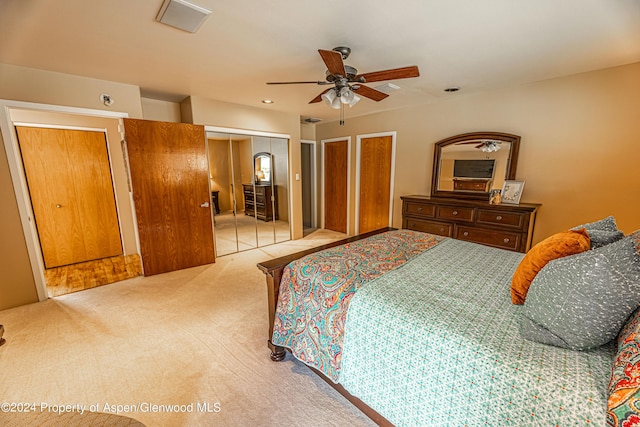 1001 Alta Ct, Craig, CO 81625 - bedroom featuring carpet, multiple closets, and a ceiling fan