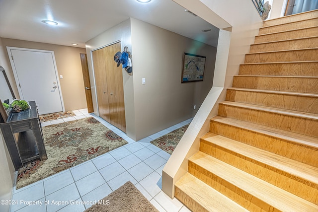 1001 Alta Ct, Craig, CO 81625 - tiled foyer featuring stairs and recessed lighting