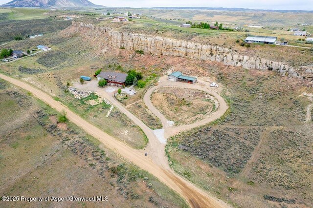 289 Lewis Ln, Craig, CO 81625 - aerial overview of property's location featuring rural landscape and mountains