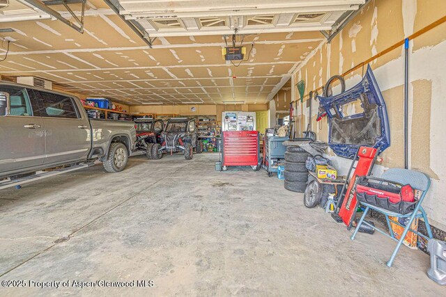 289 Lewis Ln, Craig, CO 81625 - garage featuring a garage door opener