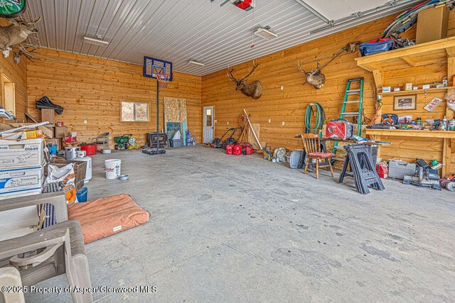289 Lewis Ln, Craig, CO 81625 - garage featuring wooden walls