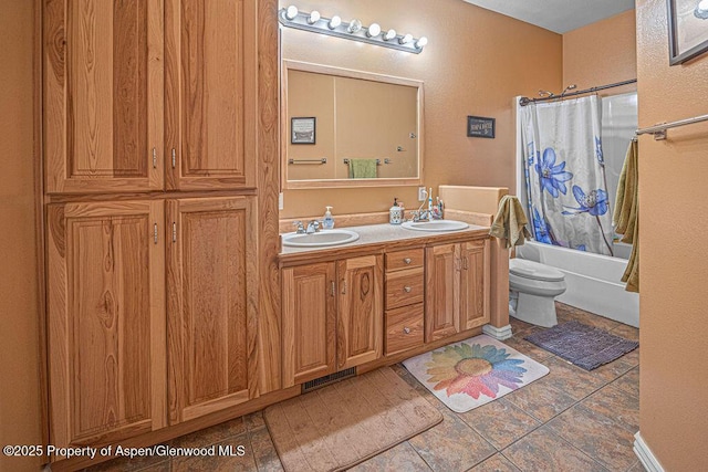 289 Lewis Ln, Craig, CO 81625 - full bath with shower / tub combo with curtain, double vanity, and toilet