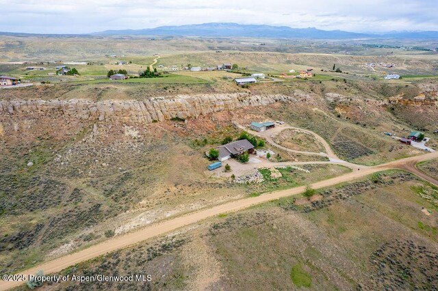 289 Lewis Ln, Craig, CO 81625 - aerial overview of property's location featuring rural landscape and mountains