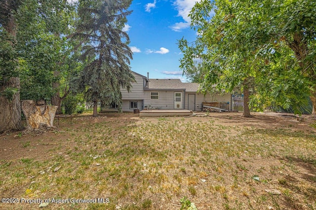 813 Finley Ln, Craig, CO 81625 - rear view of property featuring a lawn