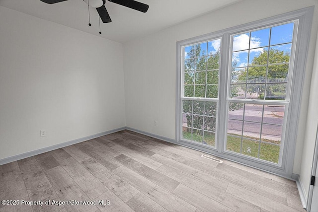 813 Finley Ln, Craig, CO 81625 - empty room with a ceiling fan and wood finished floors
