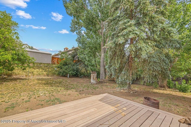 813 Finley Ln, Craig, CO 81625 - wooden terrace featuring an outdoor fire pit