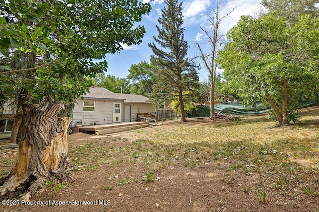 813 Finley Ln, Craig, CO 81625 - view of yard with a wooden deck