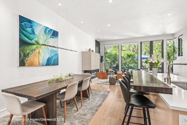 155 Lone Pine Rd Unit 2, Aspen, CO 81611 - dining space with light wood-type flooring and recessed lighting