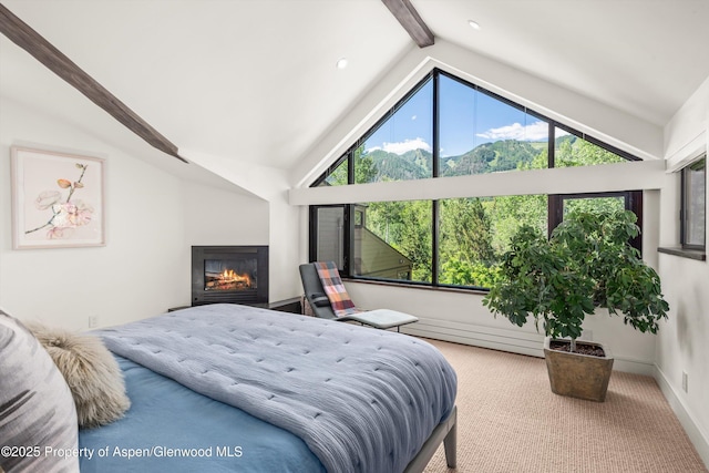 155 Lone Pine Rd Unit 2, Aspen, CO 81611 - bedroom featuring beam ceiling, carpet flooring, a glass covered fireplace, recessed lighting, and a mountain view