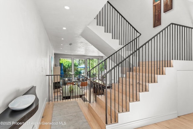 155 Lone Pine Rd Unit 2, Aspen, CO 81611 - stairs with wood finished floors and recessed lighting