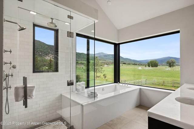 295 Aspen Valley Ranch Rd, Woody Creek, CO 81656 - bathroom featuring a bath, a mountain view, lofted ceiling, double vanity, and a shower stall
